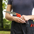 Folding Pruning Saw 602 by Felco - woman holding saw